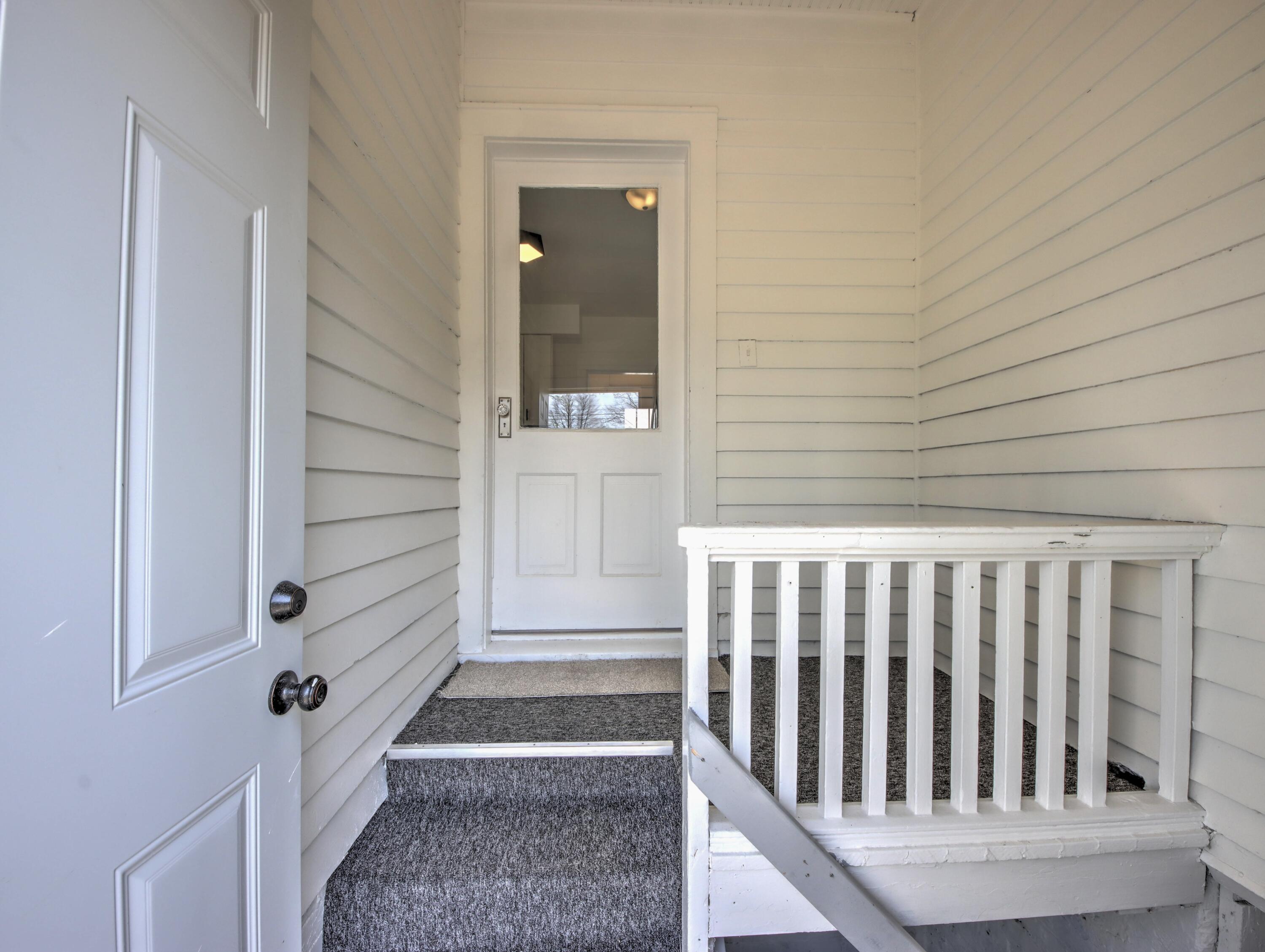 508 F Street La Porte, IN 46350 - Photo 40 of 52 a view of staircase with white walls and railing