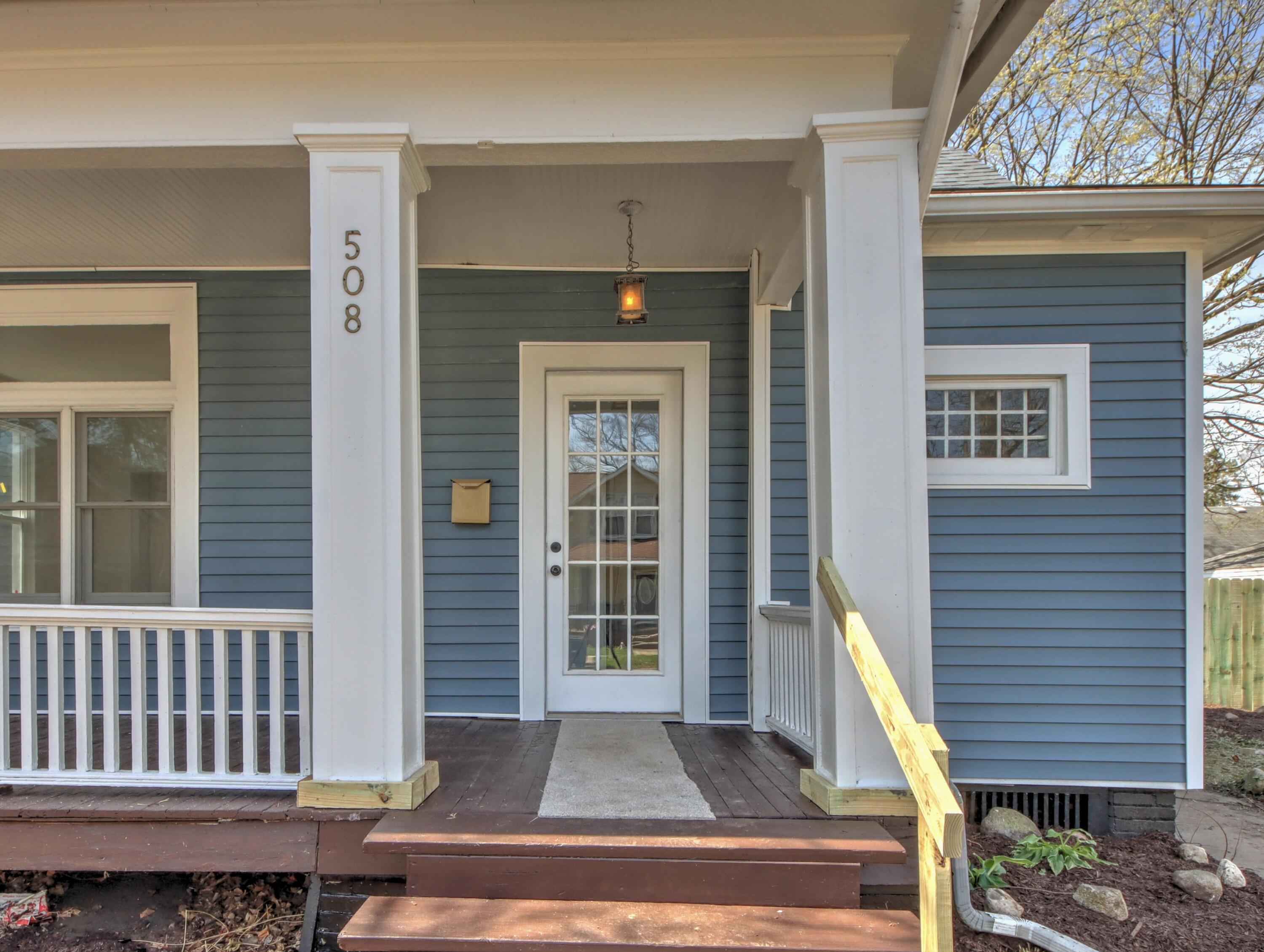 508 F Street La Porte, IN 46350 - Photo 4 of 52 a front view of a house with a porch