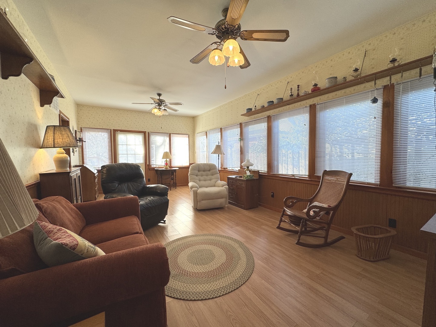 13 Erin Lane Kankakee, IL 60901 - Photo 12 of 34 a living room with furniture ceiling fan and a rug