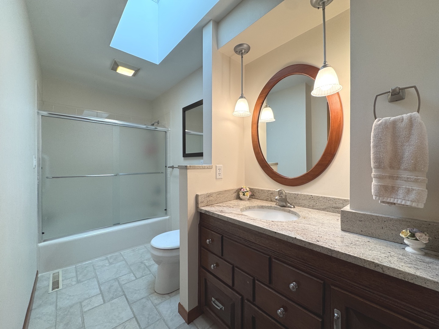 13 Erin Lane Kankakee, IL 60901 - Photo 17 of 34 a bathroom with a sink a toilet and a mirror