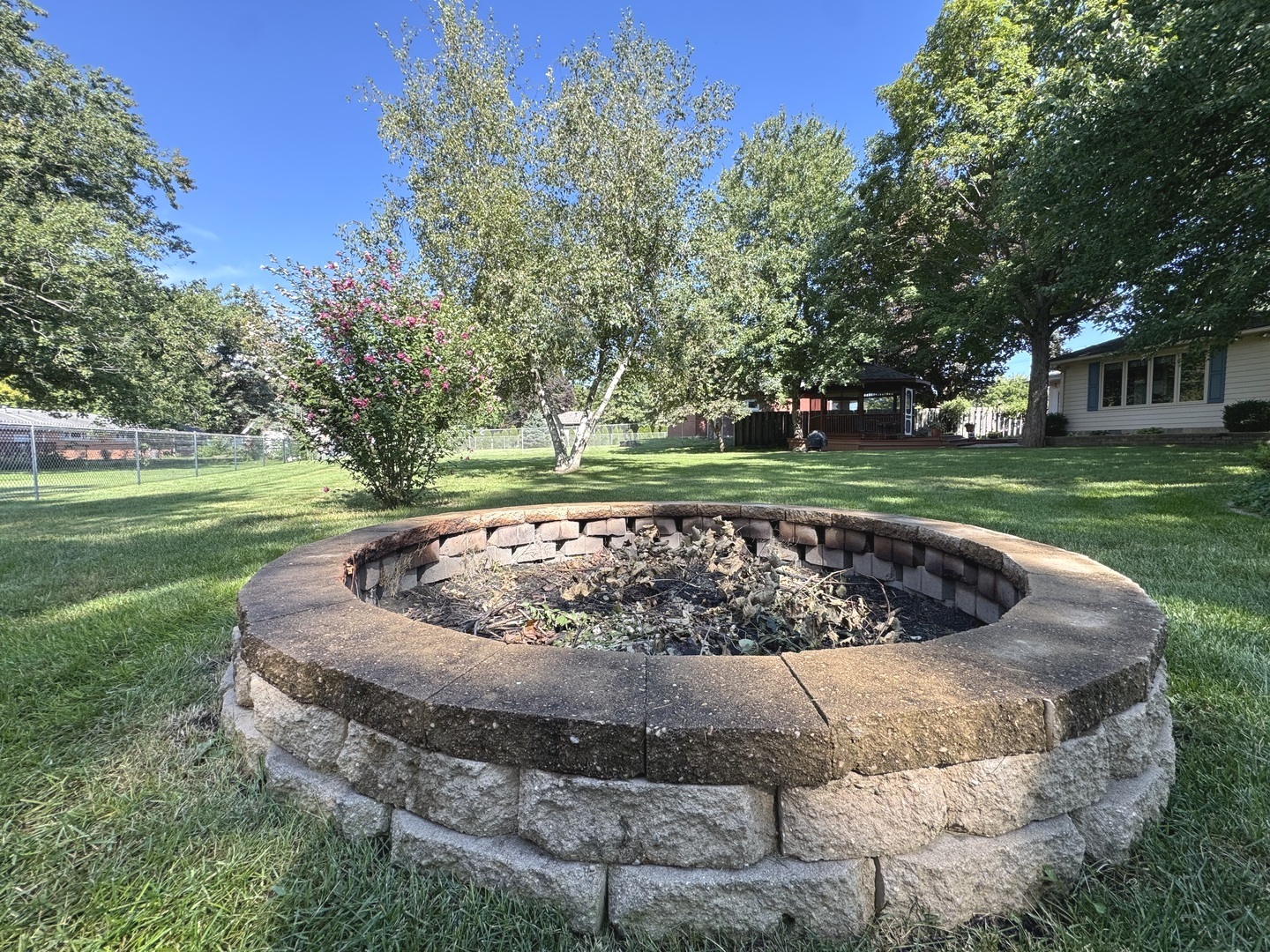13 Erin Lane Kankakee, IL 60901 - Photo 25 of 34 a view of a yard with a fountain