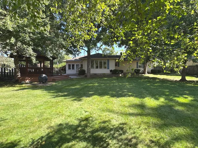a view of a house with a big yard