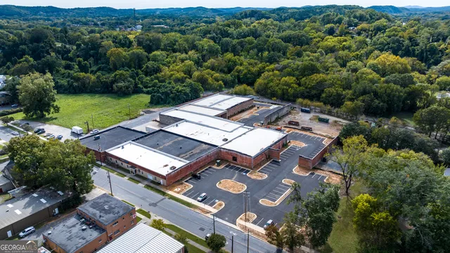 an aerial view of a house with a garden