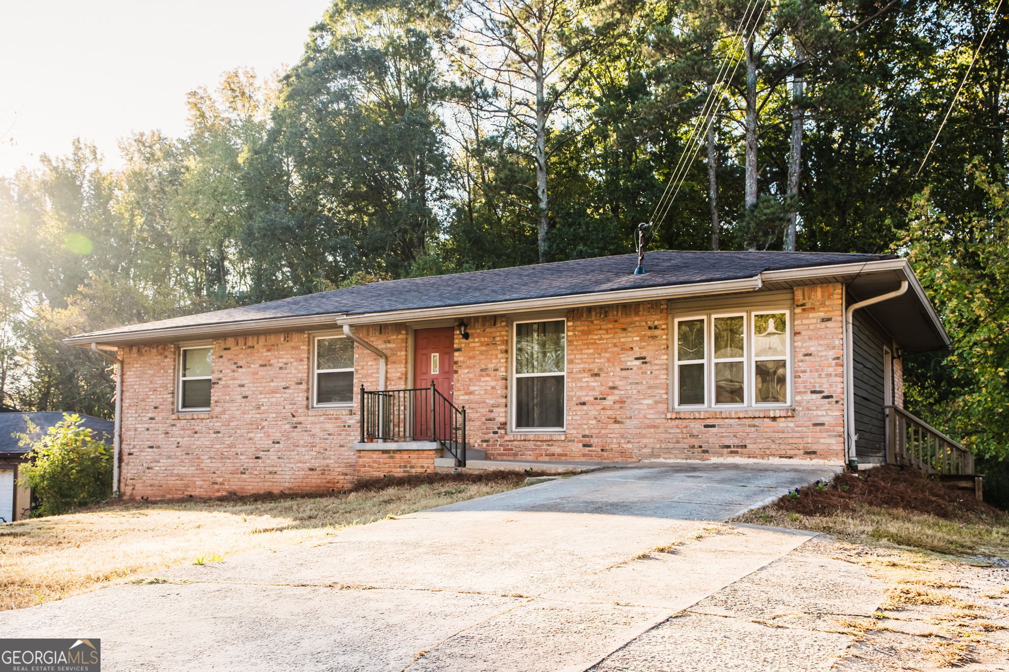 front view of a house with a patio