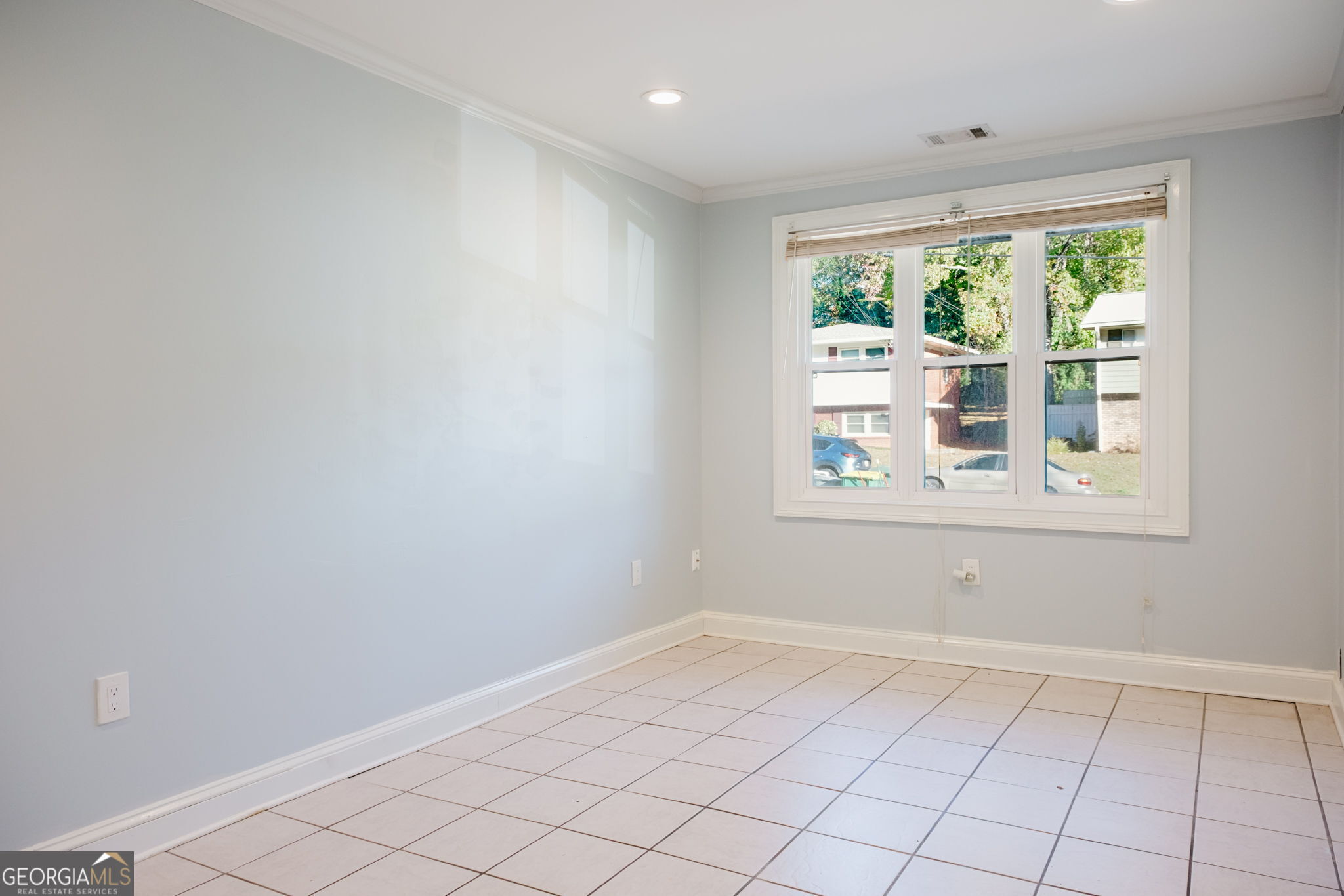 893 Slash Pine Road Forest Park, GA 30297 - Photo 28 of 38 a view of an empty room with a window