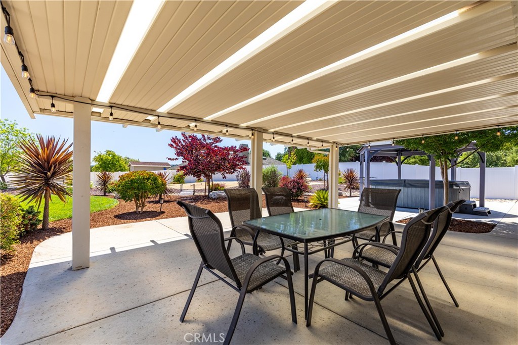 1275 Shane Lane Templeton, CA 93465 - Photo 46 of 70 a view of a dining room with furniture and chandelier