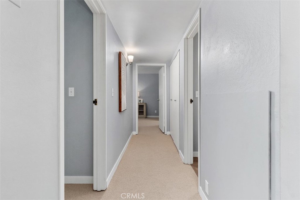 12300 Montecito Road, Unit 39 Seal Beach, CA 90740 - Photo 22 of 41 Hallway to bedrooms, guest bath and laundry room