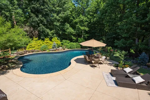 $975,000 | 212 Middlegreen Place, Holly Springs, NC 27540