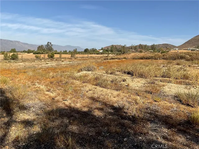 a view of residential houses with outdoor space