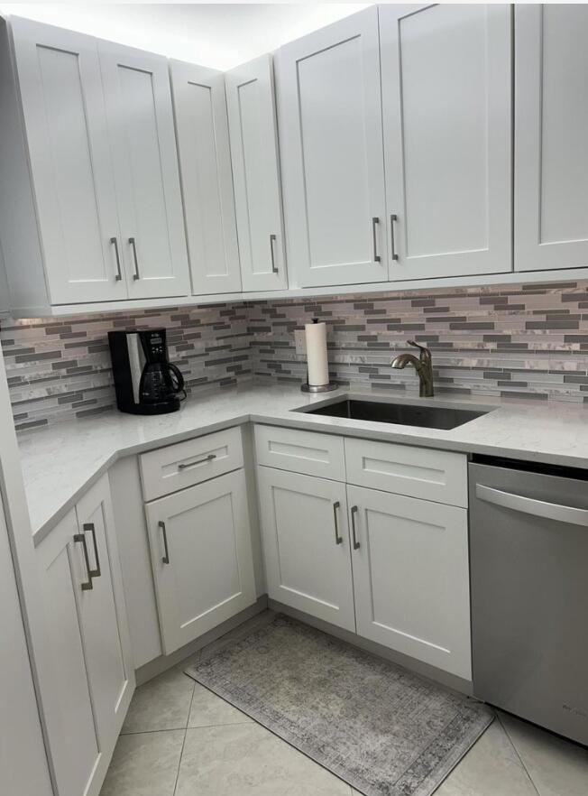 5851 Camino Del Sol, Unit 203 Boca Raton, FL 33433 - Photo 1 of 30 KITCHEN