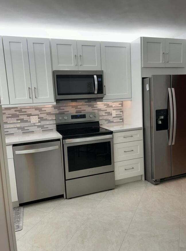 5851 Camino Del Sol, Unit 203 Boca Raton, FL 33433 - Photo 4 of 30 KITCHEN