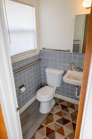 a view of an empty room with windows