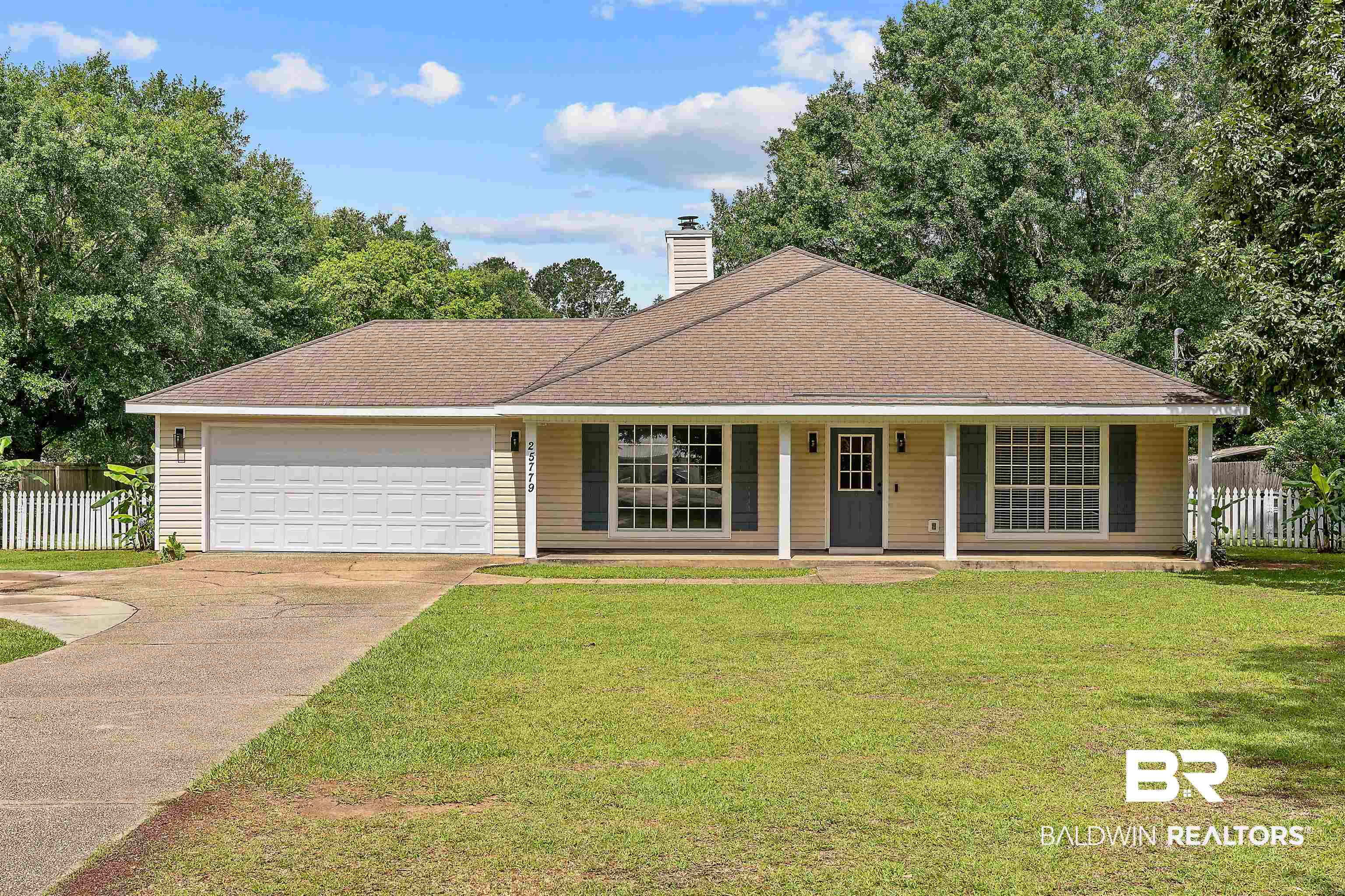 25779 Austin Road Daphne, AL 36526 - Photo 1 of 30 Ranch-style house featuring driveway, a garage, a chimney, and a porch