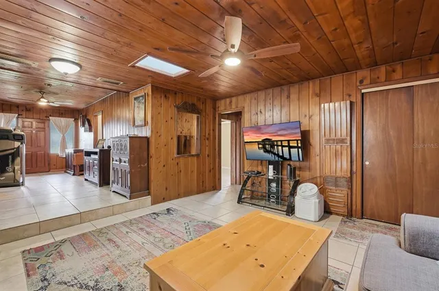 a view of a living room and dining room