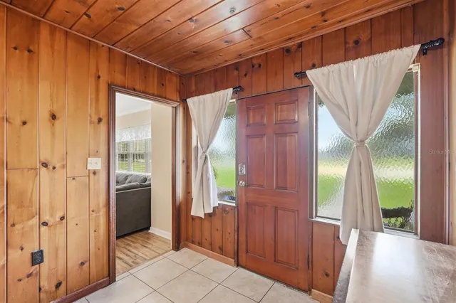 a view of a bathroom with a glass door and shower