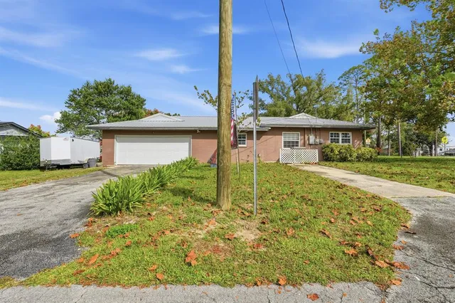 a house view with a garden space