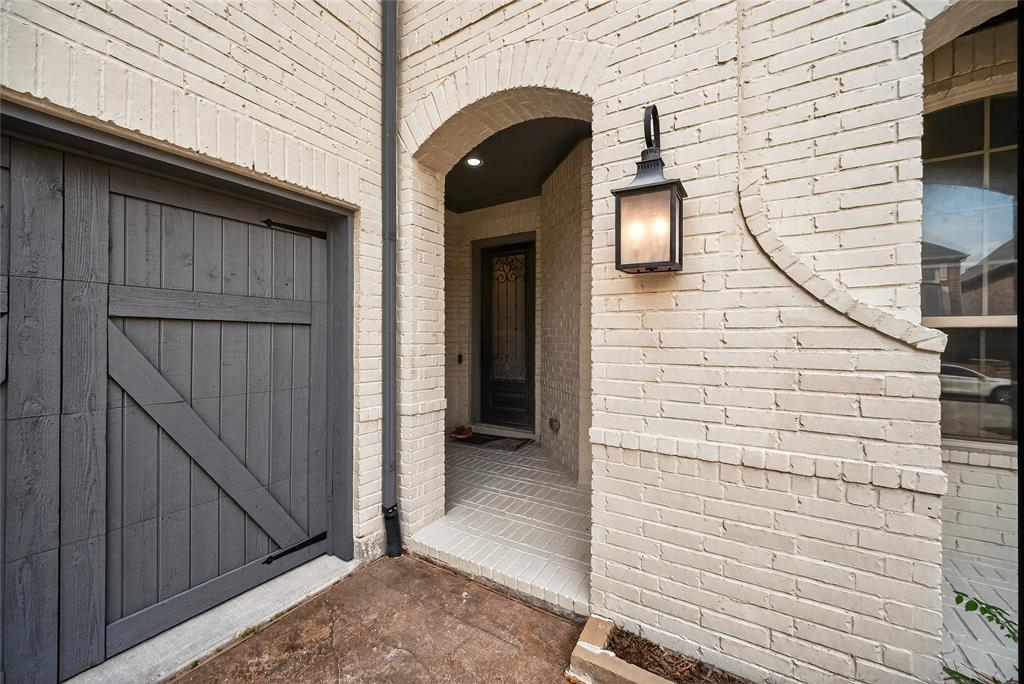 1039 Stephen Street Allen, TX 75013 - Photo 5 of 40 View of exterior entry with brick siding