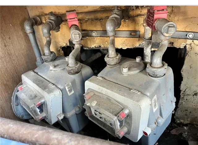 a view of a house with a tree