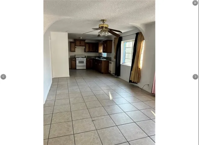 a view of a kitchen with a sink