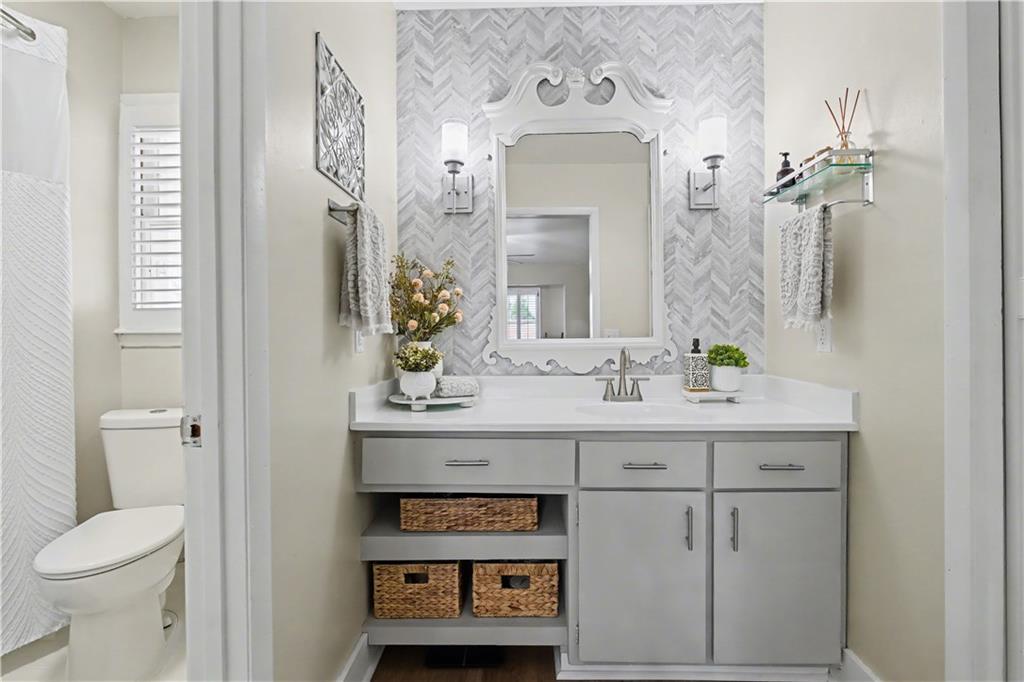 1833 Tom Odum Road Vidalia, GA 30474 - Photo 23 of 59 a bathroom with a sink and a mirror