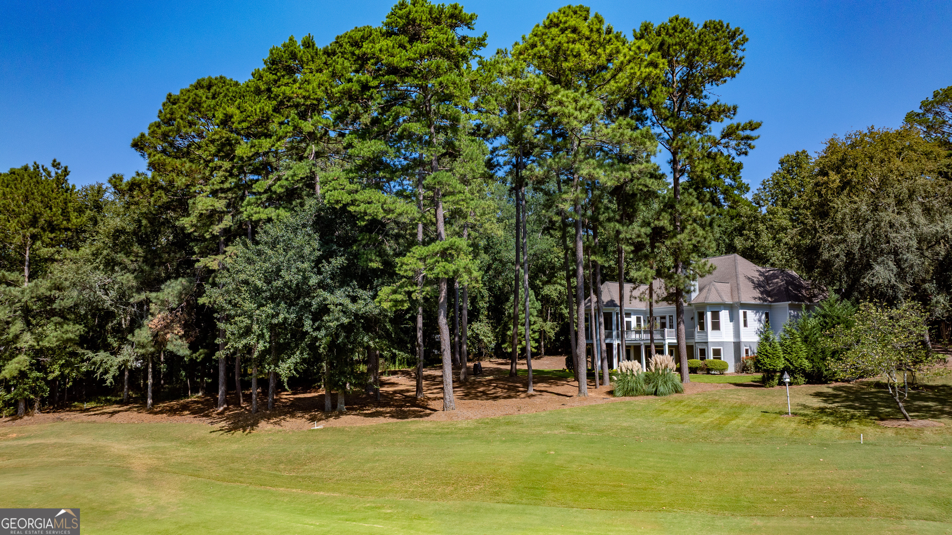1011 Ridge Terrace Greensboro, GA 30642 - Photo 12 of 72 a view of a house with swimming pool and sitting area