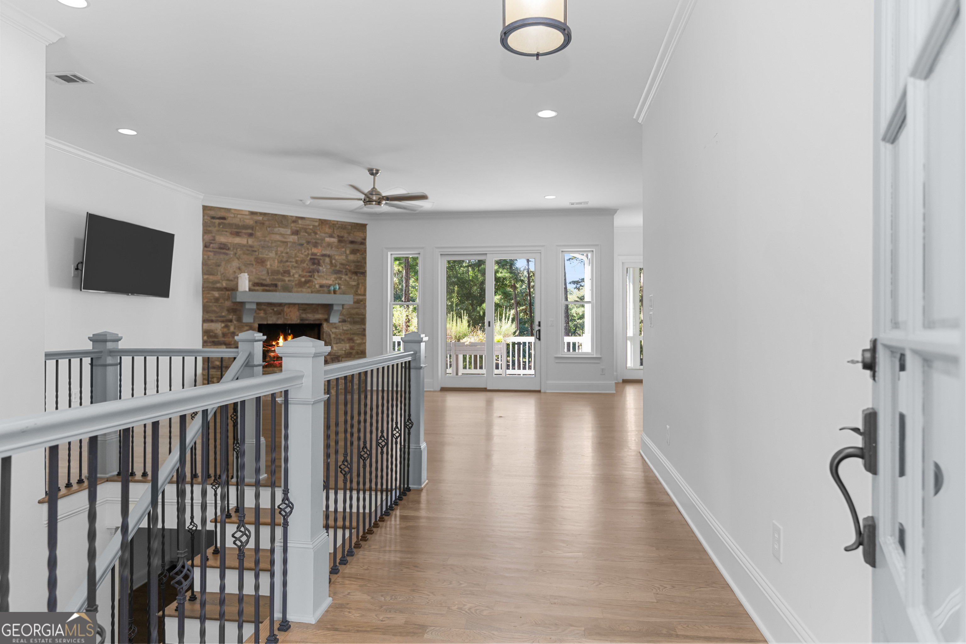 1011 Ridge Terrace Greensboro, GA 30642 - Photo 14 of 72 a view of a room with wooden floor and windows