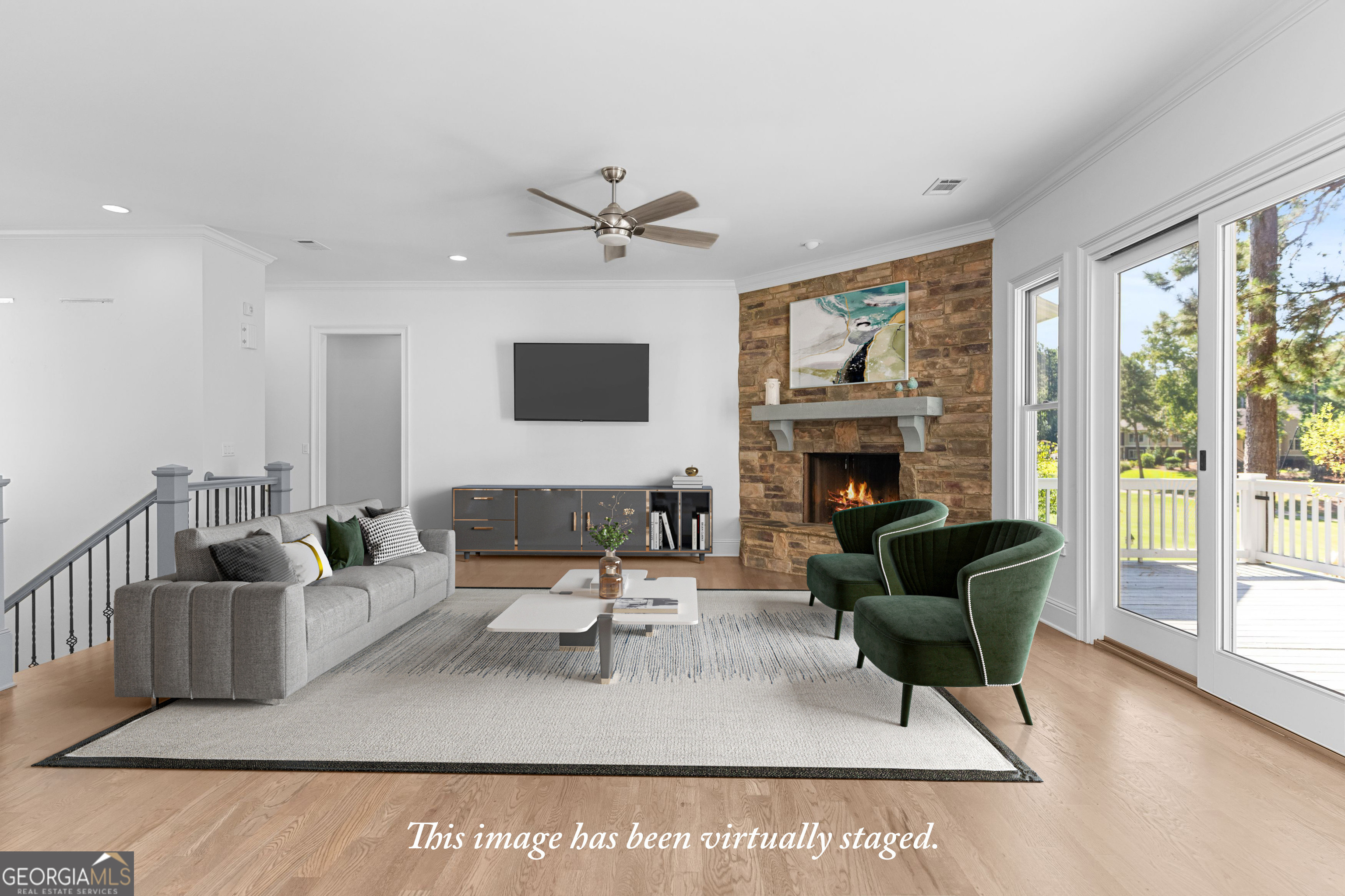 1011 Ridge Terrace Greensboro, GA 30642 - Photo 19 of 72 a living room with furniture a large window and a fireplace