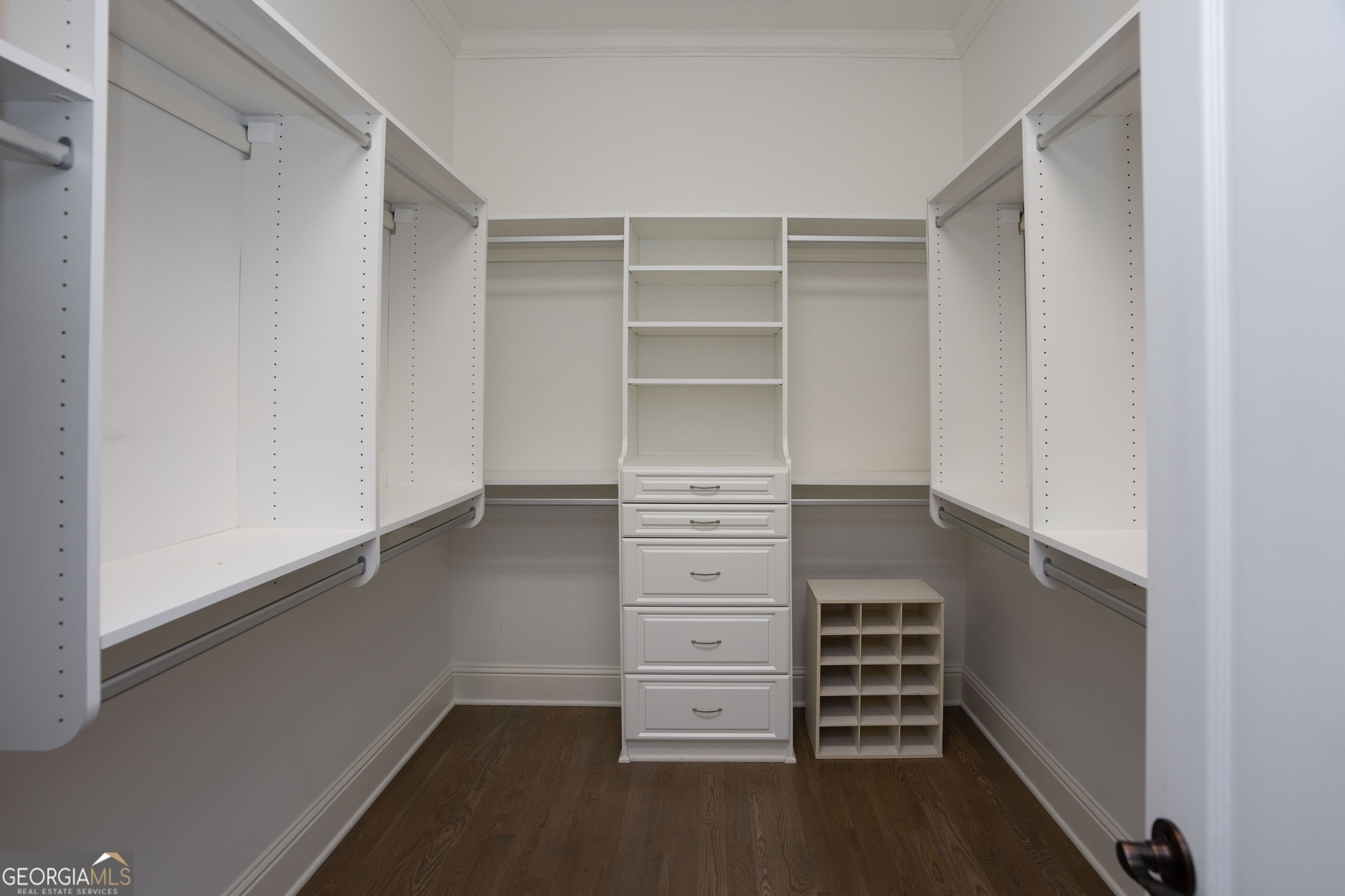 1011 Ridge Terrace Greensboro, GA 30642 - Photo 40 of 72 a view of walk in closet with empty racks