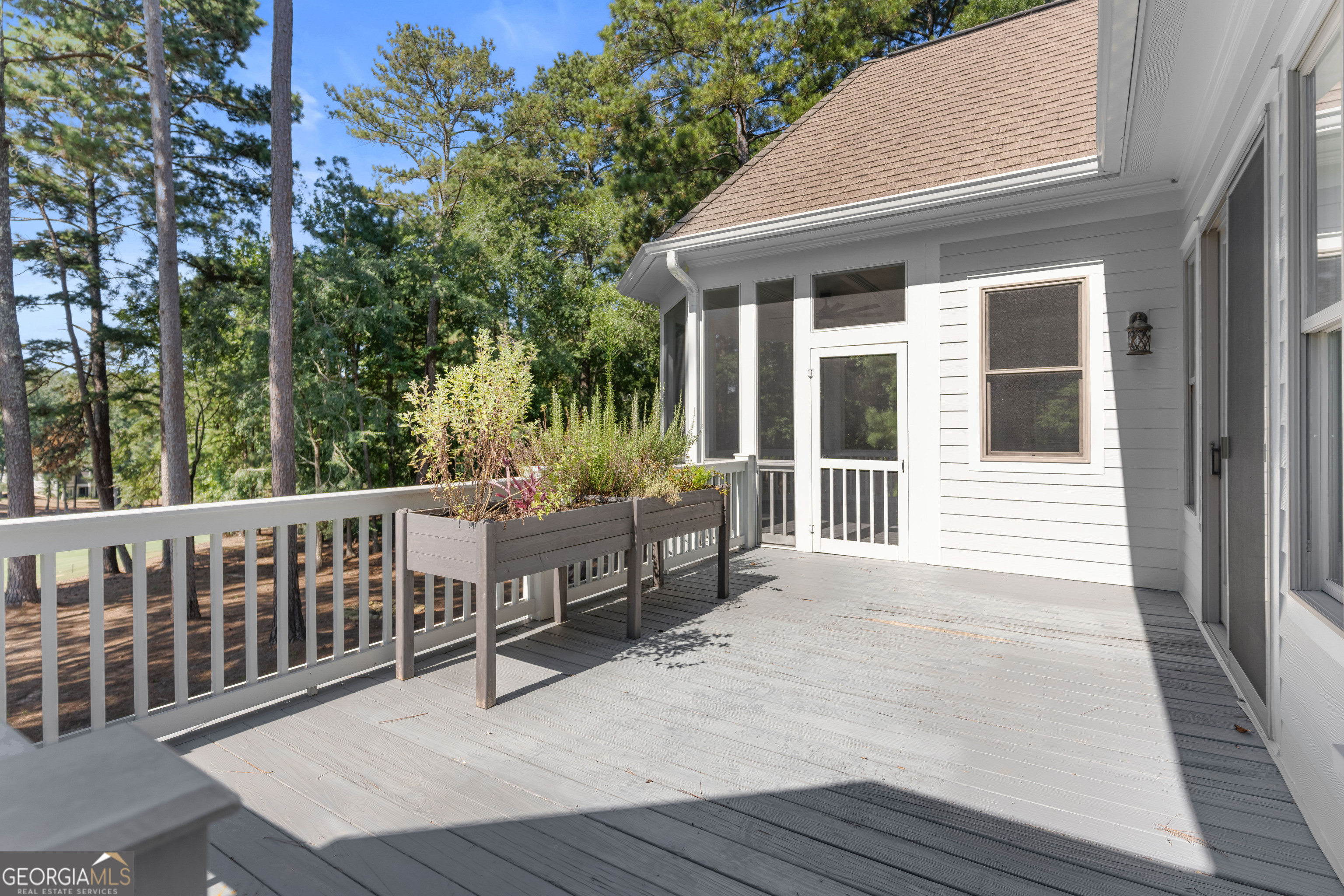 1011 Ridge Terrace Greensboro, GA 30642 - Photo 45 of 72 a view of a house with deck and wooden floor