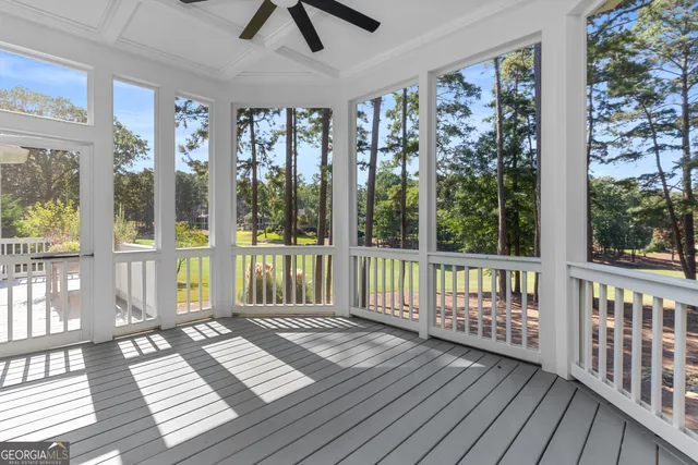 a view of an house with backyard space and garden