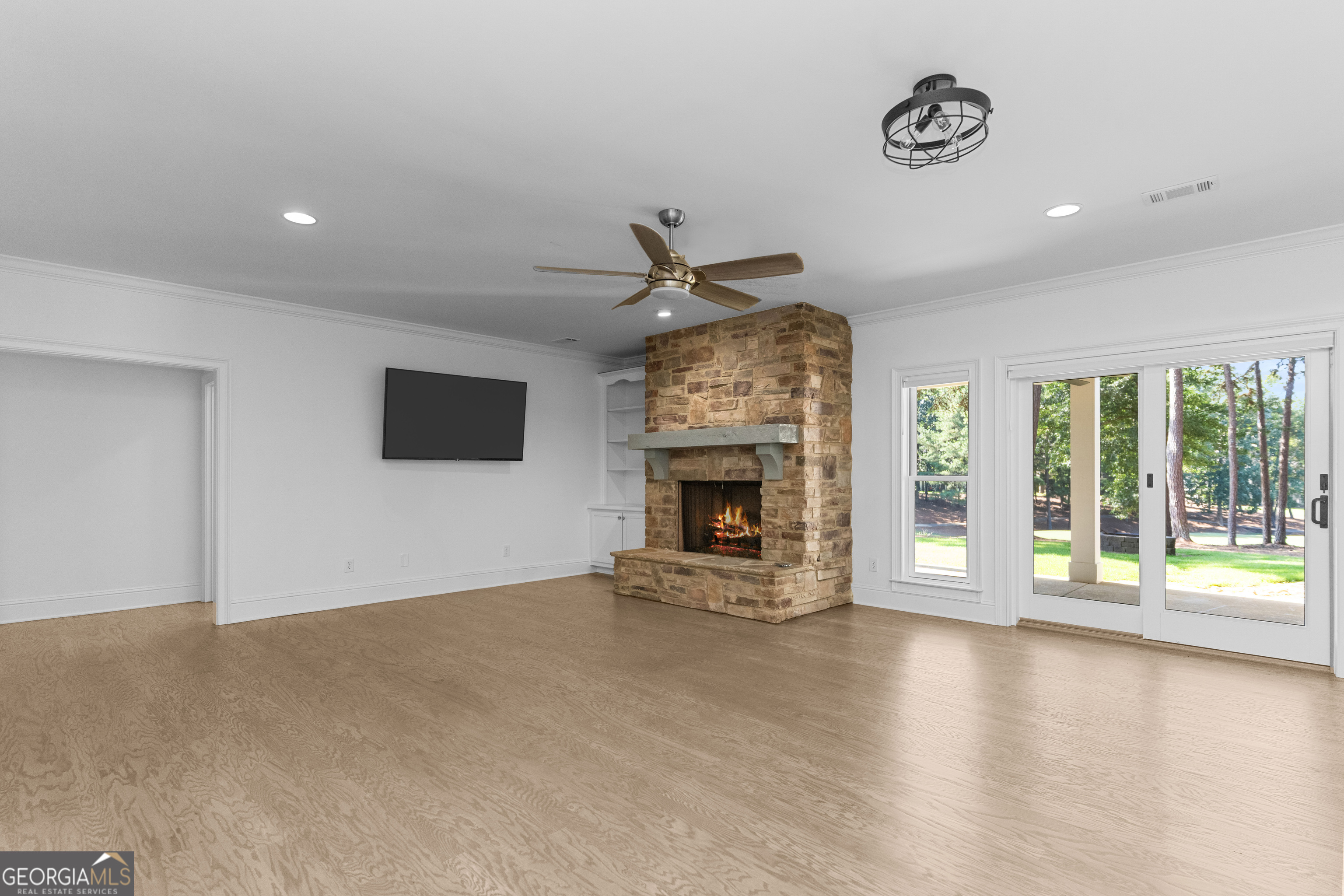 1011 Ridge Terrace Greensboro, GA 30642 - Photo 52 of 72 a view of an empty room with a fireplace