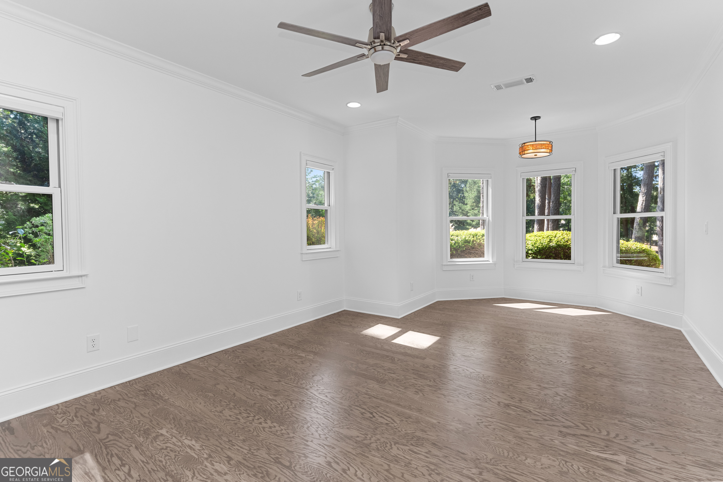 1011 Ridge Terrace Greensboro, GA 30642 - Photo 59 of 72 wooden floor in an empty room with a window