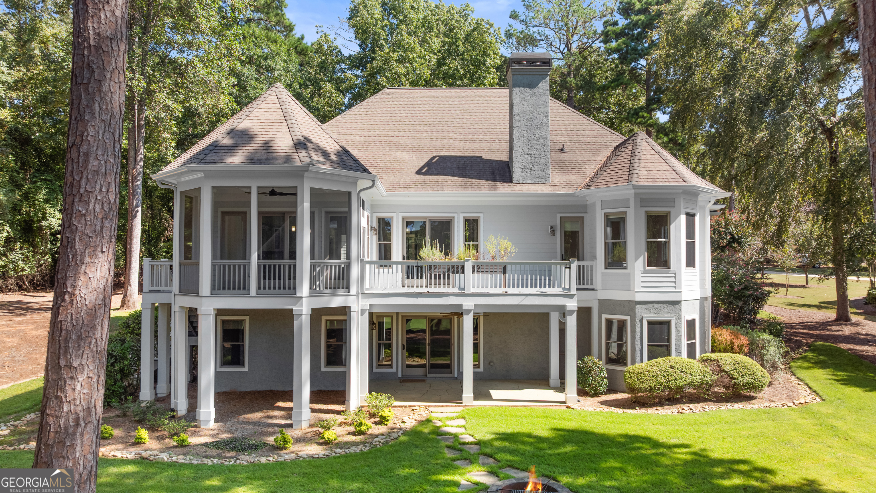 1011 Ridge Terrace Greensboro, GA 30642 - Photo 8 of 72 a front view of a house with a yard