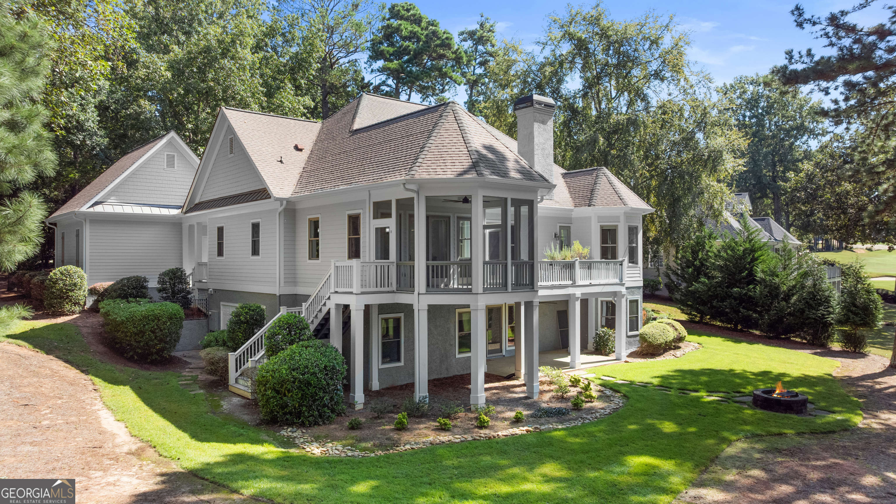 1011 Ridge Terrace Greensboro, GA 30642 - Photo 10 of 72 a view of a house with a yard and potted plants