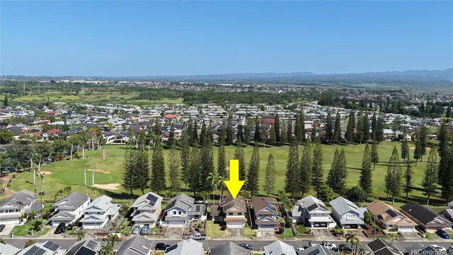 an aerial view of a city with lake view