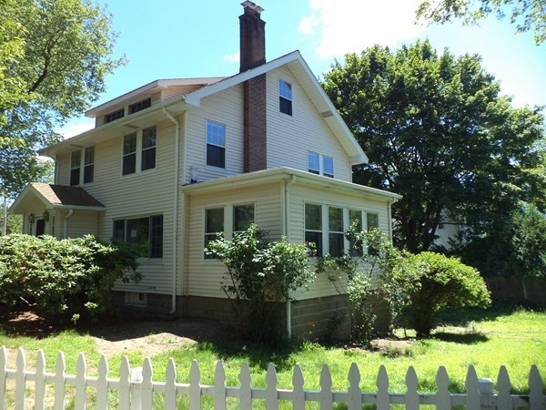 11 Jackson Road Medford, MA 02155 - Photo 2 of 12 a front view of house with a yard