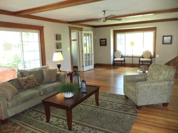11 Jackson Road Medford, MA 02155 - Photo 7 of 12 a living room with furniture and a large window