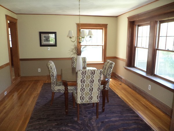 11 Jackson Road Medford, MA 02155 - Photo 8 of 12 a view of a dining room with furniture and wooden floor