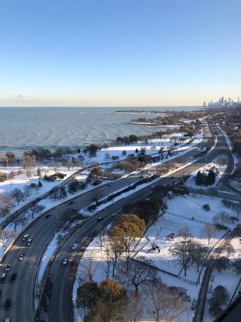 5701 North Sheridan Road, Unit 29T Chicago, IL 60660 - Photo 2 of 11 a view of a city with ocean