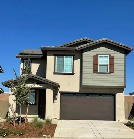 a house view with a outdoor space
