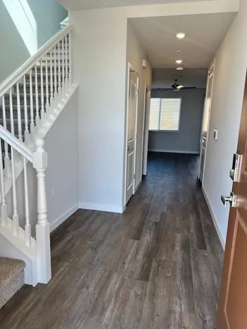 a view of entryway with wooden floor