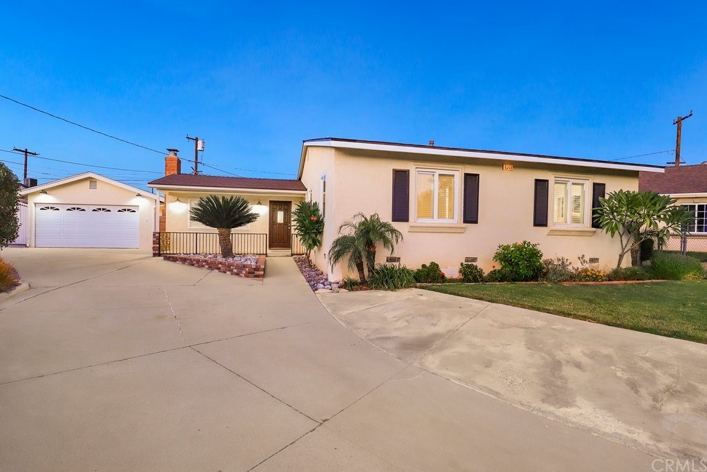 9549 Sara Court Riverside, CA 92503 - Photo 1 of 1 a front view of a house with a yard