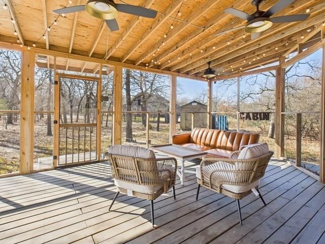 7386 Clint Court Athens, TX 75752 - Photo 11 of 40 a balcony with wooden floor