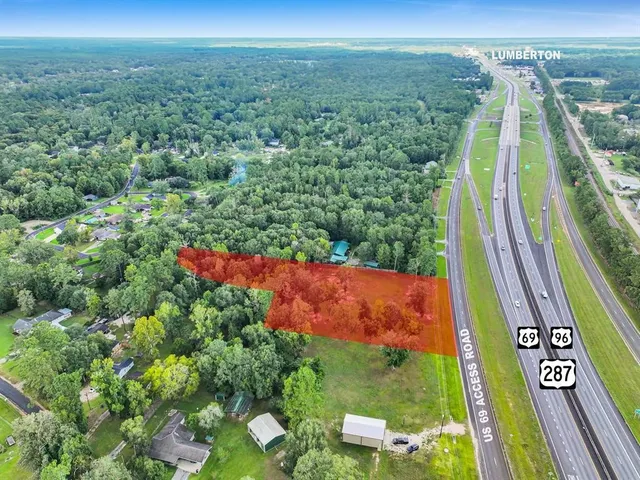 a view of a yard with an outdoor space