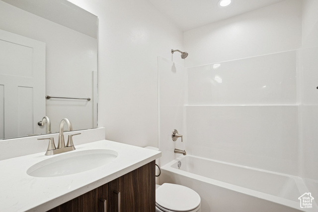 1615 North Angel Street, Unit H Layton, UT 84041 - Photo 26 of 55 Bathroom featuring bathing tub / shower combination and vanity