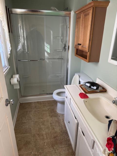 1092 Mount Pleasant Road Pamplin, VA 23958 - Photo 13 of 17 a bathroom with a sink a toilet and shower