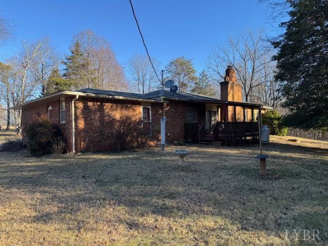 1092 Mount Pleasant Road Pamplin, VA 23958 - Photo 2 of 17 a front view of a house with garden