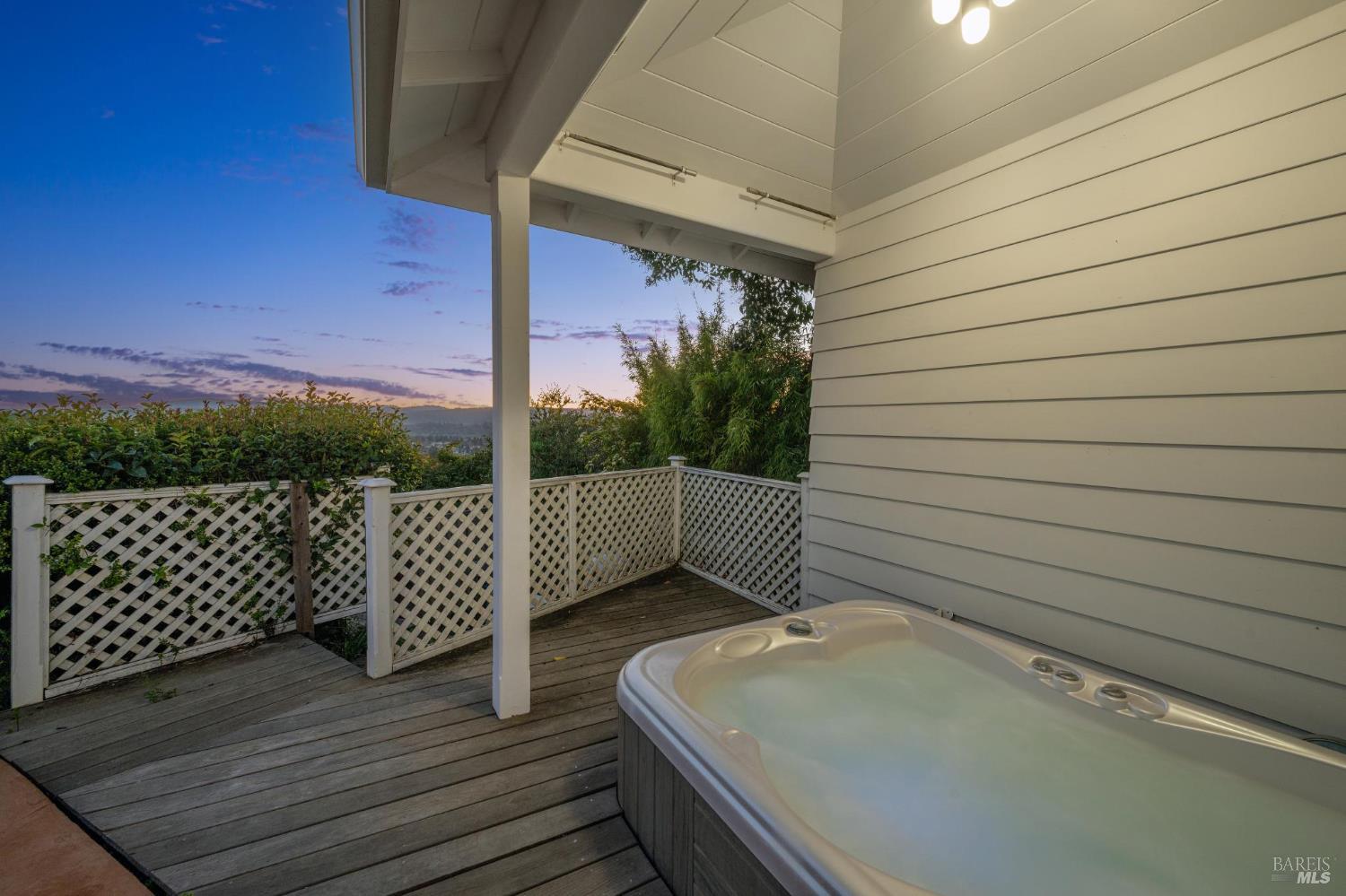 1236 North Fitch Mountain Road Healdsburg, CA 95448 - Photo 15 of 70 a view of a roof deck with wooden floor and fence