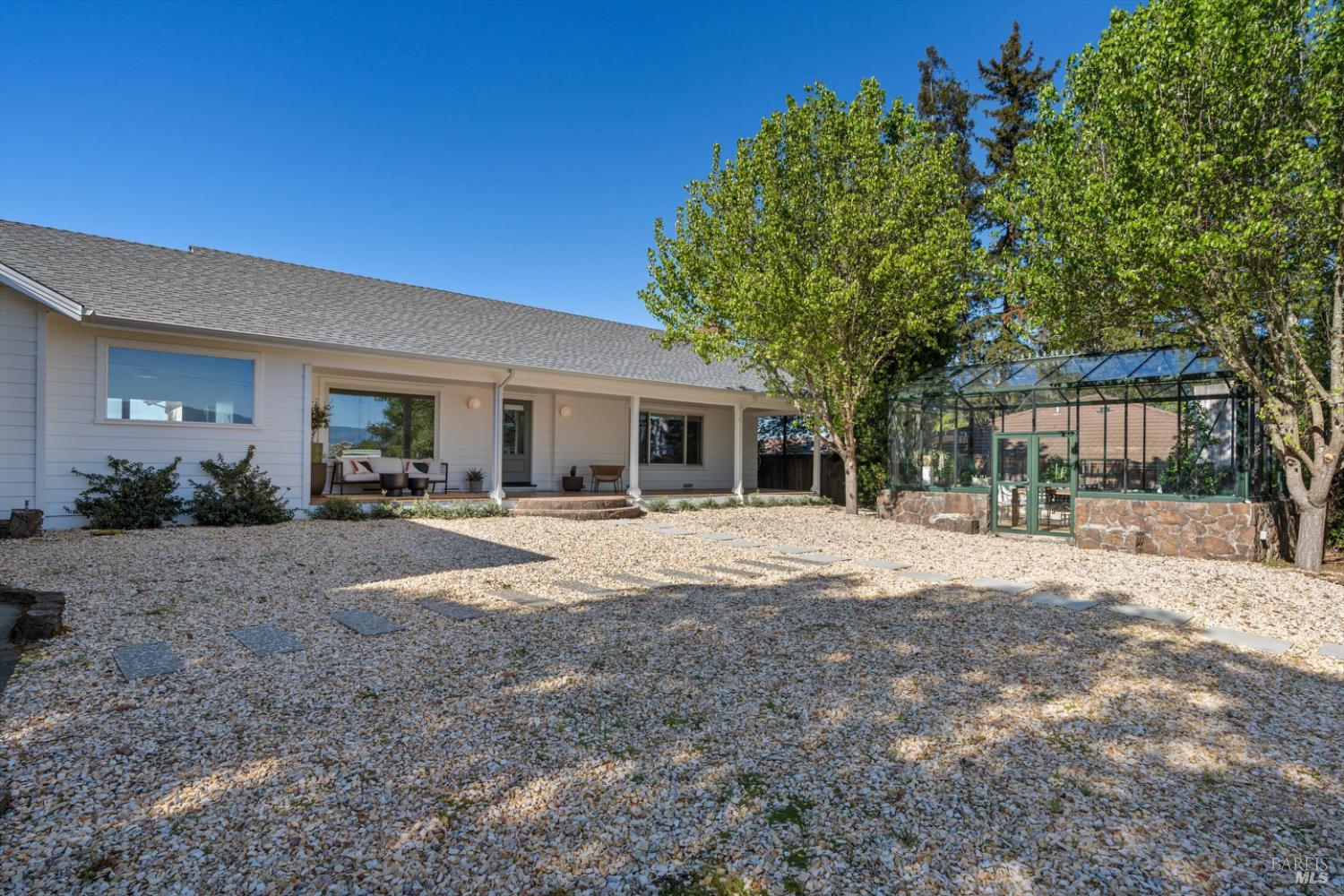 1236 North Fitch Mountain Road Healdsburg, CA 95448 - Photo 26 of 70 a view of a house with backyard and a tree