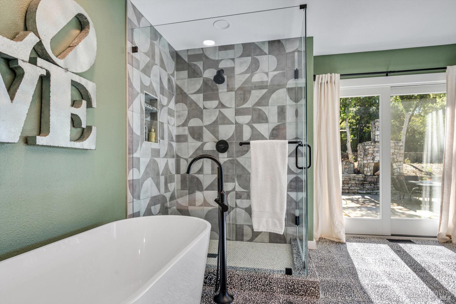 1236 North Fitch Mountain Road Healdsburg, CA 95448 - Photo 49 of 70 a bathroom with a bathtub and shower